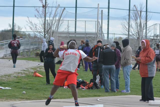 Chayvon Buckingham was fourth in the discus for Alton on Friday. (Photo by Dan Brannan)