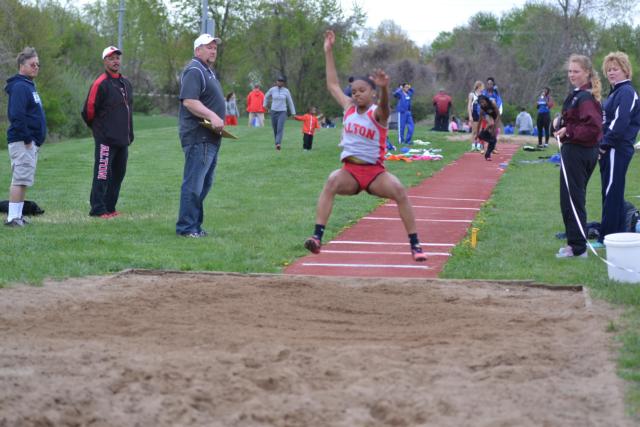 LaJarvia Brown leaped for the longest mark in the triple jump in Illinois history for girls on Wednesday at Edwardsville. (Photos by Dan Brannan)