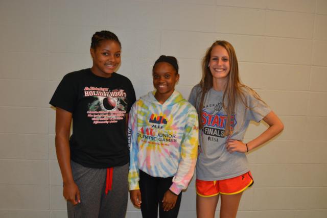 Alton's state qualifiers for the IHSA Class 3A state meet are Jewell Wagner, LaJarvia Brown and Katie Mans. (Photo by Dan Brannan)