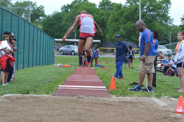 Alton's girls track and field team has never witnessed jumping abilities possessed by LaJarvia Brown, shown in this photo. (Photo by Dan Brannan)