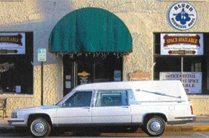 Hearse leads curious to Alton Cemetery