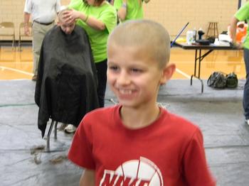 Lucas Henry after having his head shaved for the St. Baldrick's fundraiser