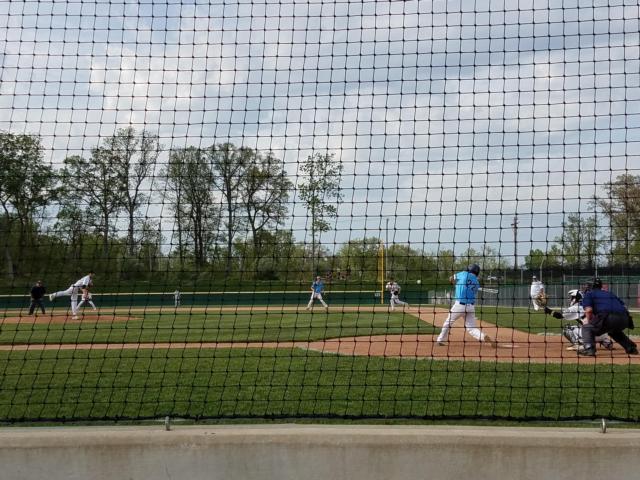 Alton and Belleville East played a tight 10-inning game, with Alton prevailing in a big Southwestern Conference win 7-6. (Photo by Pat Schwarte)